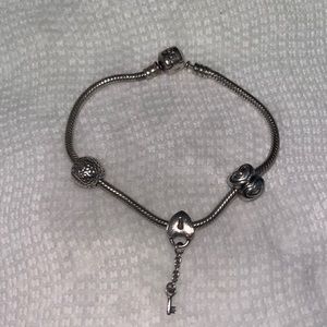 Pandora bracelet with three silver Pandora charms